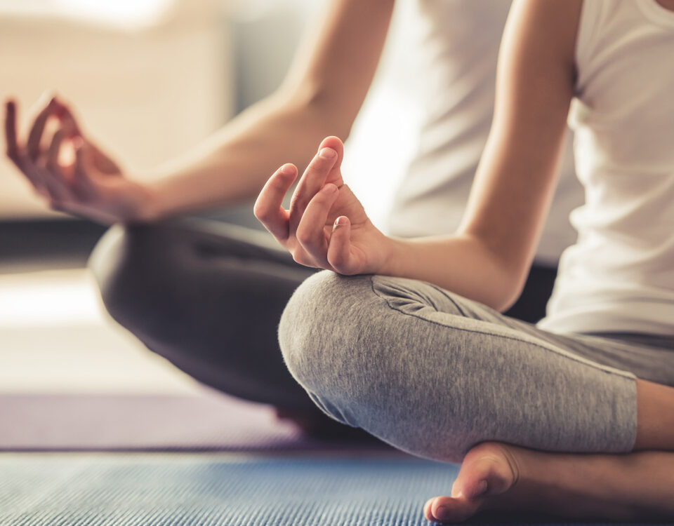 yoga students meditating